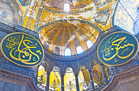ISTANBUL, TURKEY - JANUARY 13, 2015: The ancient walls and ceiling of Hagia Sophia  with the calligraphic medalions, on January 13 in Istanbul.のeditorial素材