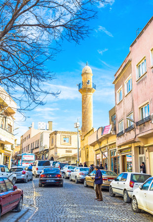 MARDIN, TURKEY - JANUARY 14, 2015: The medieval minaret in the city centre, on January 14 in Mardin.のeditorial素材