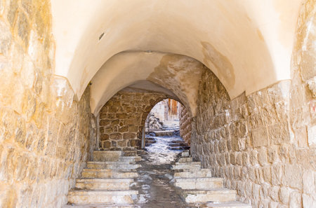 The medieval Mardin is full of the narrow streets and tiny passes under the houses, Turkey.のeditorial素材