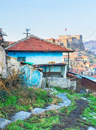 The tiny house with the Ankara citadel on the background, Turkey.のeditorial素材