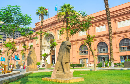 CAIRO EGYPT  OCTOBER 9 2014: The Egyptian museum surrounded by the green garden with numerous ancient statues on October 9 in Cairo.のeditorial素材