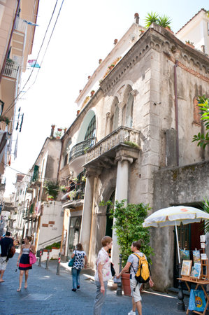 AMALFI, ITALY - OCTOBER 5, 2012: The old streets hide beautiful medieval villas, numerous tiny cafes and stalls, on October 5 in Amalfi.のeditorial素材