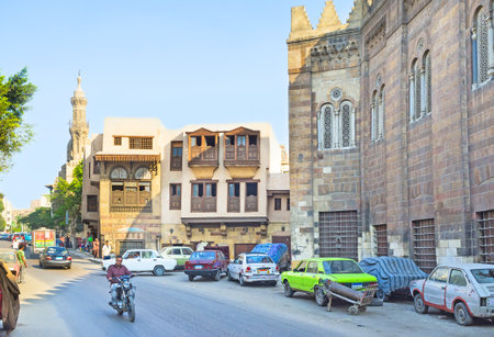 CAIRO, EGYPT - OCTOBER 9, 2014: The medieval architecture of Sheikhoun street with the old mosques and scenic mansions, on October 9 in Cairo.のeditorial素材