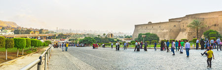 CAIRO, EGYPT - OCTOBER 9, 2014: Tourists after the visiting of Saladin Citadel go down from the hill, on October 9 in Cairo.のeditorial素材