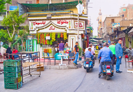 CAIRO, EGYPT - OCTOBER 9, 2014: The juice stall with many fresh fruits located at the food market, on October 9 in Cairo.のeditorial素材