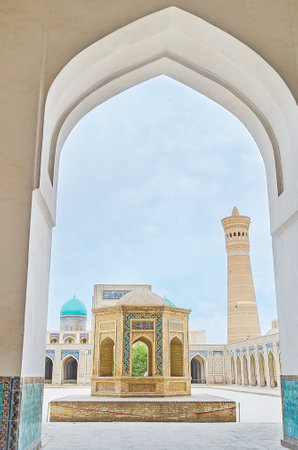 The view on the sheikh tomb and the cortyard of Kalyan Mosque from the arch, Bukhara, Uzbekistan.