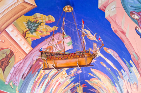 TROODOS, CYPRUS - AUGUST 2, 2014: The ceiling of the terrace decorated with colorful icons and the wooden model of the warship, Kykkos monastery, on August 2 in Troodos.のeditorial素材