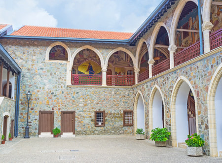 The courtyard of the Kykkos Monastery, decorated with the mosaic icons on the terrace of the second floor, Troodos, Cyprus.のeditorial素材