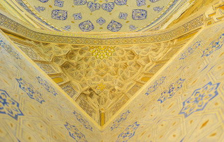 SAMARKAND, UZBEKISTAN - May 1, 2015: The geometric patterns and unusual shape of the semi-dome in corner of Shirin Beka Oka mausoleum in Shah-i-Zinda architectural complex, on May 1 in Samarkand.のeditorial素材