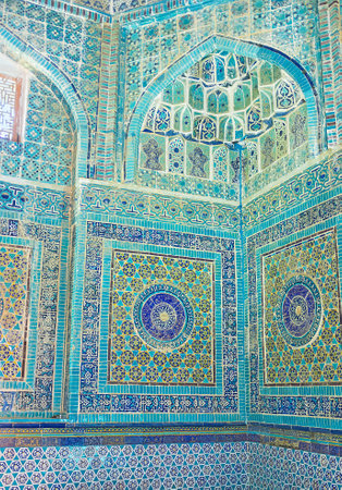 SAMARKAND, UZBEKISTAN - May 1, 2015: The bright blue tiles on the walls of  mausoleum of Shodi Mulk Oko in Shah-i-Zinda architectural complex, on May 1 in Samarkand.のeditorial素材