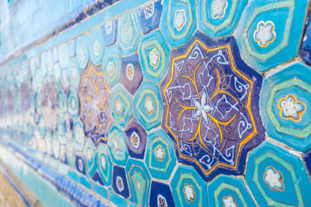 The mausoleum's portal decorated with the blue stars  and flowers made of glazed tiles, Samarkand, Uzbekistan.のeditorial素材