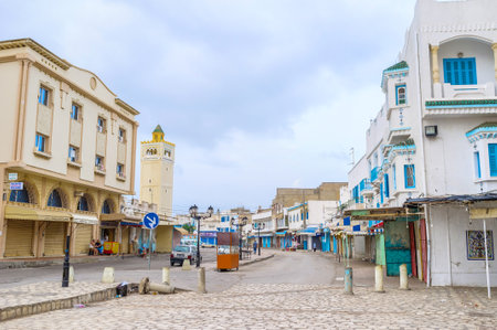 BIZERTE, TUNISIA - SEPTEMBER 5 2015: The central shopping streetis empty in the morning, on...