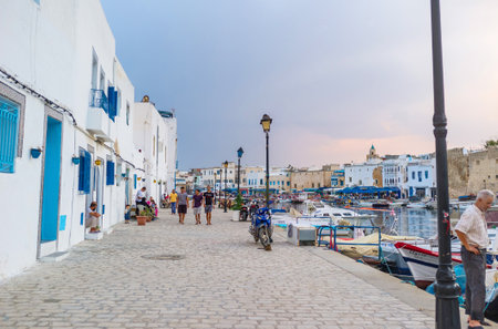 BIZERTE, TUNISIA - SEPTEMBER 4, 2015: The breezy evening is the best time to discover the old port of Bizerte, on September 4 in Bizerte.のeditorial素材