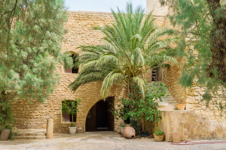 The courtyard of the Kasbah fortress has its own shady garden, Hammamet, Tunisia.