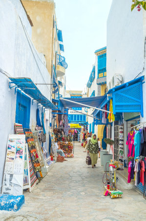 HAMMAMET, TUNISIA - SEPTEMBER 6, 2015: All the small Medina is the tourist area, so the workshops, stalls and art galleries are everywhere, on September 6 in Hammamet.のeditorial素材