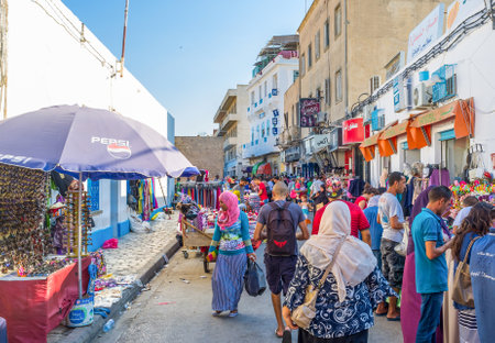 SOUSSE, TUNISIA - AUGUST 29, 2015: Morning is the best time for the shopping at the local market, on August 29 in Sousse.のeditorial素材