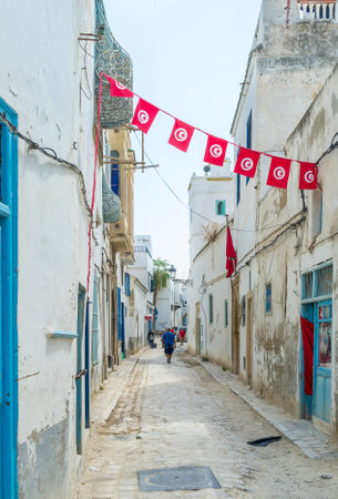 TUNIS, TUNISIA - SEPTEMBER 2, 2015: Even old and narrow streets of Medina become festive with beautiful decorations, on September 2 in Tunis.のeditorial素材