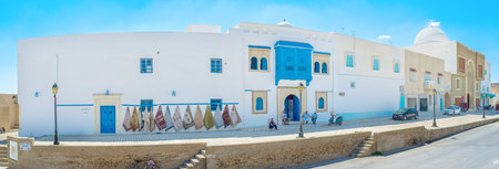 KAIROUAN, TUNISIA - AUGUST 30, 2015: The historic neighborhood next to the Grand Mosque is occupied by numerous rug stores and workshops, on August 30 in Kairouan.のeditorial素材