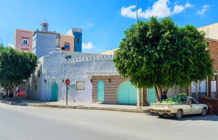 KAIROUAN, TUNISIA - AUGUST 30, 2015: The tiny mosque in the old residential neighborhood located...