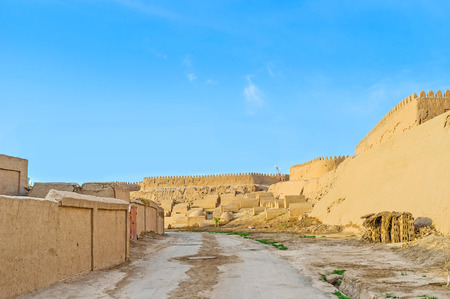 The south wall of Khiva fortification with numerous ancient tombs on its base, Uzbekistan.の写真素材