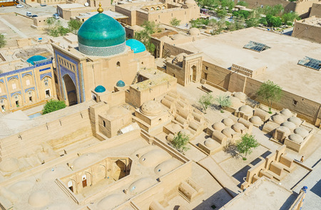 The aerial view of the medieval cemetery and  Pahlavon Mahmud Mausoleum from Islam Khoja Minaret, Uzbekistan.の写真素材