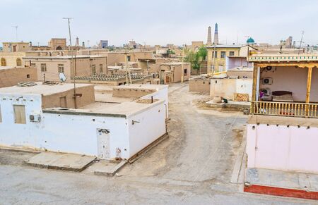 The old Uzbek town with clay and brick houses, surrounded by the fortress wall, Khiva.の写真素材