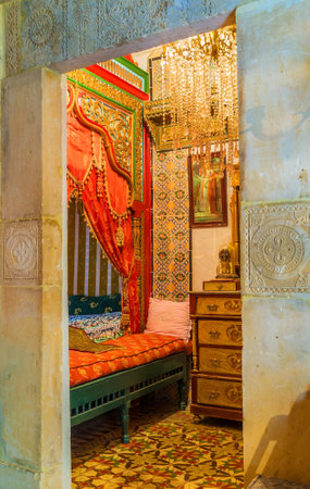 SOUSSE, TUNISIA - SEPTEMBER 3, 2015: The carved stone entrance frames the view to the beautiful...