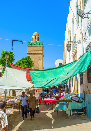 SFAX, TUNISIA - SEPTEMBER 3, 2015: The giant second hand market in Medina next to Bab El Kasbah Gates, on September 3 in Sfax.のeditorial素材