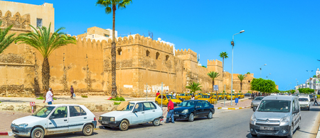 SFAX, TUNISIA - SEPTEMBER 3, 2015: The ramparts of old Medina surrounded by the wide roads, often with traffic jams, on September 3 in Sfax.のeditorial素材