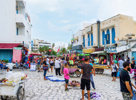 SOUSSE, TUNISIA - SEPTEMBER 6, 2015: The central square of Medina is the best place for spontaneous market, because it's the most visitible in old town, on September 6 in Sousse.のeditorial素材