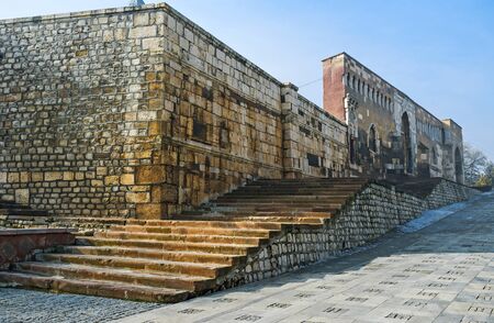 The high stone walls of Alaeddin citadel hides the Sultan Mausoleum, located in courtyard, Konya, Turkey.の写真素材