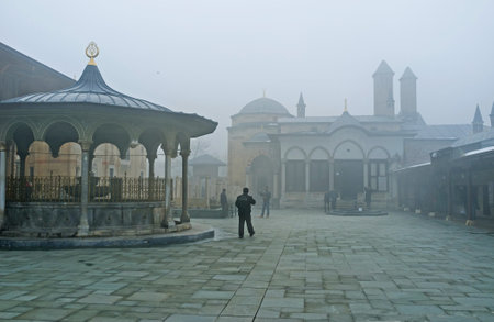 KONYA, TURKEY - JANUARY 20, 2015: The foggy view of the courtyard of Mevlana Museum, on January 20 in Konya.のeditorial素材