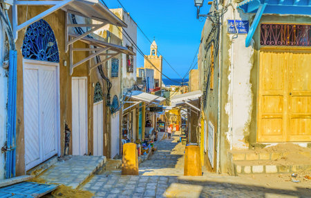 SOUSSE, TUNISIA - SEPTEMBER 1, 2015: One of the central streets of Medina that leads to the port is the old market, on September 1 in Sousse.のeditorial素材