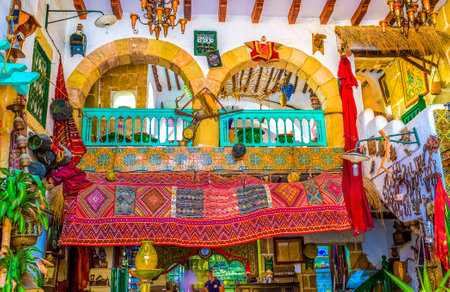 SOUSSE, TUNISIA - SEPTEMBER 1, 2015: The interior of vintage arabic restaurant looks like festive, because of many colorful details anf different unusual decorations, on September 1 in Sousse.のeditorial素材