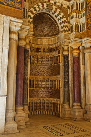 CAIRO, EGYPT - OCTOBER 12, 2014: The mihrab, decorated with islamic patterns of carved stone in Qalawun Mausoleum in the same named complex, on October 12 in Cairo.のeditorial素材