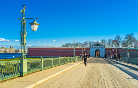 SAINT PETERSBURG - APRIL 24, 2015: The Ioanovsky Bridge was built on the foundation of the ferst bridge of the city and connects the Peter and Paul Fortress with Petrogradsky district, on April 24 in Saint Petersburg.のeditorial素材