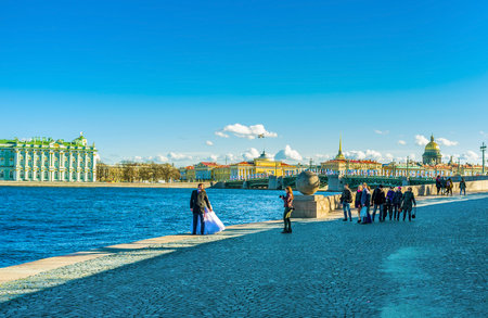 SAINT PETERSBURG - APRIL 24, 2015: The view from the Spit of Vasilievsky Island is very photogenic and the favourite place for wedding photography, on April 24 in Saint Petersburg.のeditorial素材