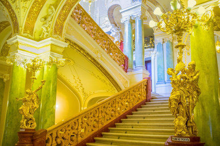 ODESSA, UKRAINE - MAY 17, 2015: The interior of the Opera Theatre is rich on golden candelabrums and golden stucco, on May 17 in Odessa.のeditorial素材