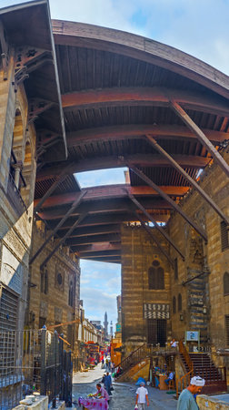 CAIRO, EGYPT - OCTOBER 12, 2014: The massive Sultan Al-Ghuri Complex consists of mosque, madrasa, mausoleum, khanqah, sabil-kuttab and the souq in covered pass, on October 12 in Cairo.のeditorial素材