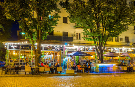 ODESSA, UKRAINE - MAY 17, 2015: The evening in Odessa locals prefer to spend with friends in restaurants or taverns, on May 17 in Odessa.のeditorial素材