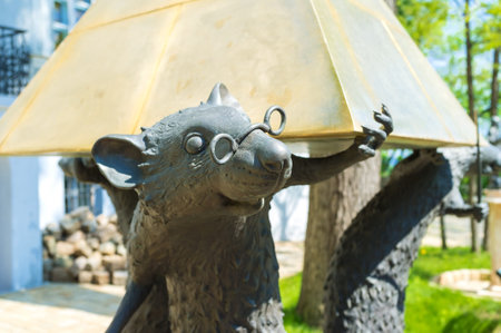 ODESSA, UKRAINE - MAY 18, 2015: The sculpture of the rats that hold the pyramid in the courtyard of the Odessa Literary Museum, on May 18 in Odessa.のeditorial素材