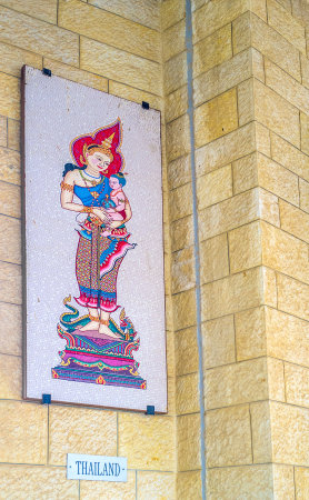 NAZARETH, ISRAEL - FEBRUARY 21, 2016: The mosaic of Madonna and the child in thai style in the arcade of the Basilica of Annunciation, on February 21 in Nazareth.のeditorial素材