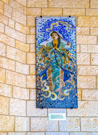 NAZARETH, ISRAEL - FEBRUARY 21, 2016: The beautiful bas-relief of Madonna was donated by indonesian christians, is located in the arcade of the Basilica of Annunciation, on February 21 in Nazareth.のeditorial素材