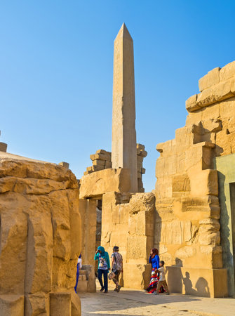 LUXOR, EGYPT - OCTOBER 7, 2014: The walk through the maze of the ancient ruins in the Karnak Temple complex, on October 7 in Luxor.のeditorial素材