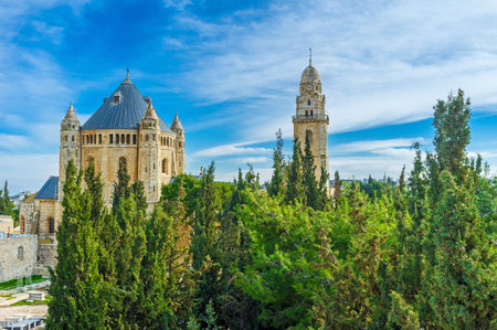 The lush coniferous garden hides the Dormition Abbey, looking like the castle, Jerusalem, Israel.のeditorial素材