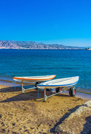 Two surfboards on the trailers after the surfing in Aqaba Gulf, Eilat, Israel.