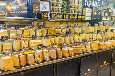 JERUSALEM, ISRAEL - FEBRUARY 17, 2016: The various types of halva, the famous Eastern dessert, in...