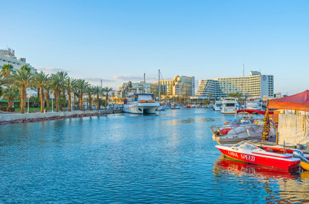 EILAT, ISRAEL - FEBRUARY 23, 2016: The scenic Lagoona of the luxury resort is full of yachts and...