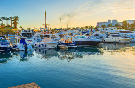 EILAT, ISRAEL - FEBRUARY 23, 2016: The Lagoona is the most picturesque place to spend the evening and watch the sunset over the yachts, on February 23 in Eilat.のeditorial素材