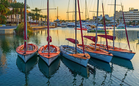 EILAT, ISRAEL - FEBRUARY 23, 2016: The small sailing yachts are dancing on the waves in Lagoona, on February 23 in Eilat.のeditorial素材
